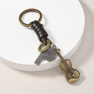 Llavero de Metal con Diseño Retro Punk Creativo, <span class=keywords><strong>Cuerda</strong></span> de Cuero Trenzada, Colgante de <span class=keywords><strong>Guitarra</strong></span>, Búho, Tortuga, Molino de Viento, Serpiente, Joyería, Regalo <span class=keywords><strong>para</strong></span> Hombre - Product Image 3
