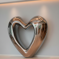 Grande sculpture extérieure en forme de coeur en acier inoxydable poli miroir sur mesure
