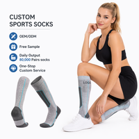 Chaussettes de compression montantes en laine mérinos tricotée pour ski et snowboard, semelle rembourrée, motif uni, collection printemps, vente en gros OEM