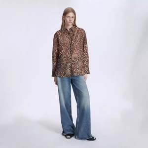 2025 Nueva colección europea americana Otoño Invierno mujer Casual estampado de leopardo camisas de manga larga Simple cómodo Suelto - Product Image 3