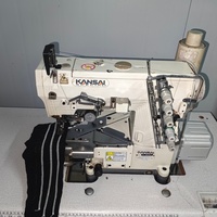 Machine à coudre à point de recouvrement d'occasion fabriquée au Japon avec moteur pour usage domestique