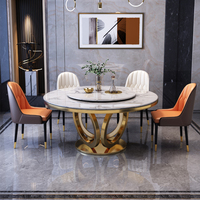 Luxuriöses Rundes Esszimmer-Set mit 4 Stühlen Gesinterter Steinoberfläche Drehbare Mittelplatte Goldene Säulenbasis für Zuhause