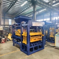 Équipement de production entièrement automatique Zhongke QT4-15 pour pavés, briques de ciment et blocs