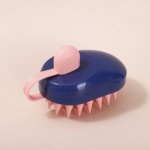 Pettine doccia in plastica di forma ovale per un'efficace esfoliazione e toelettatura dei capelli - Product Image 1