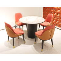 Meubles de restaurant modernes en gros, table ronde de luxe à motif marbré avec ensemble de chaises de salle à manger en cuir pour hôtel