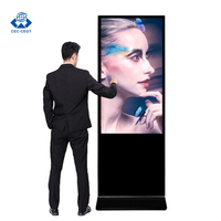 Reproductor Multimedia Publicitario Vertical LCD para Interiores Zdhq 4K de 43/50/55/65 Pulgadas, Monitor de Señalización Digital con Soporte de Pie para Centros Comerciales, SDK