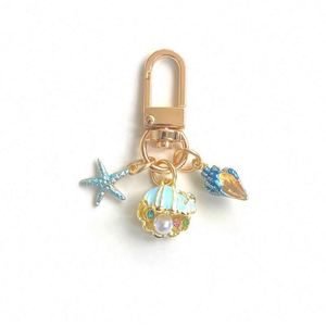 Nouveau porte-clés OCean Little Pearl Shell Starfish Conch, accessoires simples, mini pendentif de sac, porte-clés - Product Image 3