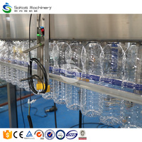Ligne de production complète Sokos pour l'embouteillage d'eau minérale en petites bouteilles, machine de remplissage d'eau pure