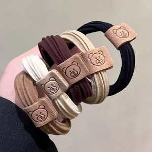 Coletero de cuero con diseño de oso, banda elástica de alta elasticidad, accesorio duradero para el cabello con forma de moño. - Product Image 1