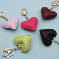 Breloques de sac en cuir PU coloré en forme de cœur avec fermoir, pendentifs pour sacs à main, porte-clés et ornements de poignet
