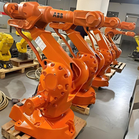 Station de travail robotisée pour soudage avec garantie de 2 ans, entraînement électrique, protection IP65, installation clé en main et service de formation