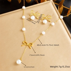 Parure de bijoux 2 pièces élégante avec nœud et perles, collier pendentif en acier inoxydable et boucles d'oreilles clous nœud, pour femme, idéale pour mariage - Product Image 4
