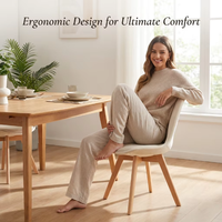 Chaise de salle à manger nordique en tissu avec assise moelleuse, chaise de cuisine rembourrée moderne et élégante pour le loisir
