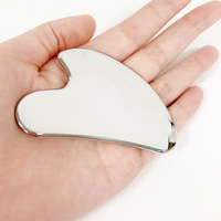 Gua sha pour lèvres en acier inoxydable personnalisé, grattoir pour le corps Gua Sha en métal en forme de lèvre de vente chaude