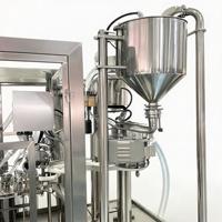 Machine de remplissage et de scellage automatique hydraulique pour sachets à bec verseur, boissons gazeuses, garantie 1 an, facile à utiliser