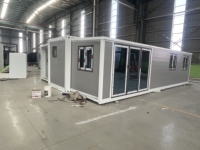 Maison préfabriquée modulaire en acier de 20 pieds, maison miniature pliable en plein air, salon extensible, utilisation hôtelière peu coûteuse et mobile