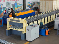 Machine de formage de tôles pour planchers métalliques à commande PLC standard / Machine de formage de tuiles de type pont