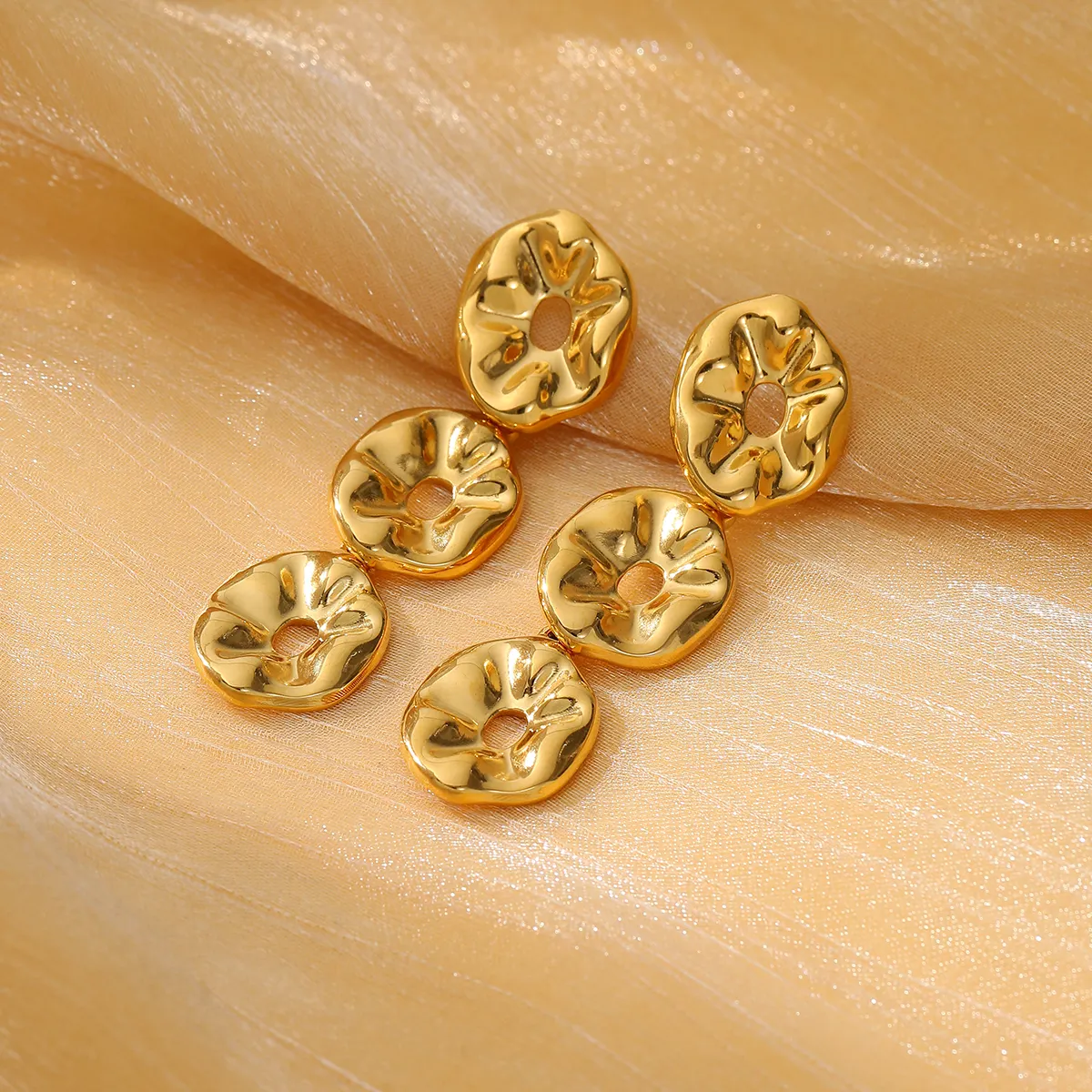 Modische 18k gold plattiert Edelstahl Zahnring drei Kreise Tropfen-Ohrring hohl Lava-Strukturierung Lotusblatt-Ohrring für Damen