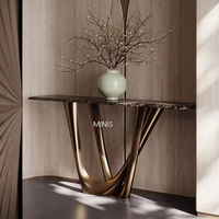 Table console d'entrée moderne et minimaliste en marbre naturel, couleur or, design italien haut de gamme, pour salon, hôtel, hall.