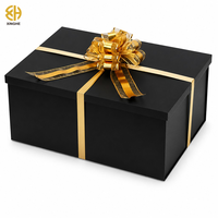 Boîte cadeau rigide de luxe noire mate grande et profonde avec ruban doré à nœud, emballages en carton pour vêtements et cadeaux d'entreprise