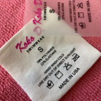 Logo de marque en film PET, logo de transfert thermique, étiquette de transfert pressée à chaud pour vêtements