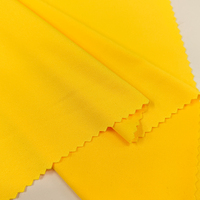 Tissu en polyester tricoté élastique Jabon pour vêtements, vente en gros