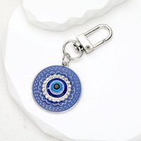 Porte-clés ethnique turc en métal émaillé, forme cœur rond, avec œil bleu porte-bonheur contre le mauvais œil