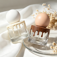 Flacons de parfum ronds vides personnalisés par le fabricant, luxueux et exquis, en verre transparent de 30 ml, avec vaporisateur.