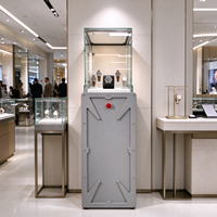 Vitrine de présentation de montres en métal gris avec dessus en verre industriel, éclairage LED, bouton rouge, CE ETL pour magasin de montres