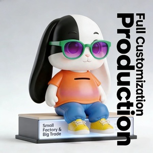 Figurines d'<span class=keywords><strong>action</strong></span> personnalisées en PVC, <span class=keywords><strong>tirelire</strong></span> lapin bicolore, design de figurine de dessin animé, figurines d'<span class=keywords><strong>action</strong></span> tendance, mascotte IP d'entreprise OEM - Product Image 4