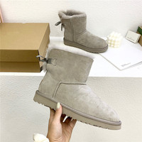 Mode peau de mouton fourrure doublure hiver chaud bottes mi-mollet en cuir court mode arc botte de neige pour femme