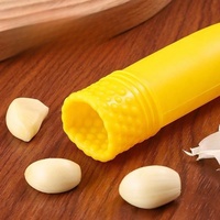 Groothandel Creatieve Huishoudelijke Plastic Knoflookpers Keukenhulpje Handmatige Knoflookpeler Fruit & Groente Gereedschap Gemakkelijk Reinigbaar Zhejiang