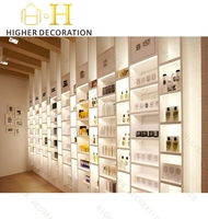 Conception moderne de magasin de parfums de luxe avec vitrine d'exposition à éclairage LED et solutions de comptoirs de magasin