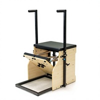 Siège de Pilates Wunda en érable durable avec accoudoirs et résistance à ressort réglable pour la rééducation corporelle