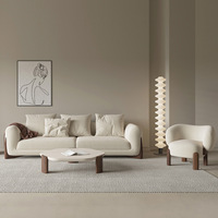 Canapé de salon minimaliste trois places en velours capitonné de style japonais, avec tissu au design discret, petit mobilier