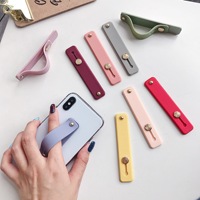 Support de téléphone portable personnalisé en gros Support de téléphone multifonctionnel paresseux avec autocollant antidérapant
