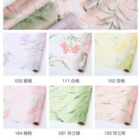 Papier de soie à motif floral non tissé en gros rouleau de papier de soie d'emballage de papier de soie personnalisé