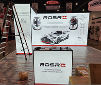 Stand d'exposition modulaire pour branding d'entreprise avec mur en tissu SEG et boîte à lumière LED, et comptoir assorti pour salon professionnel