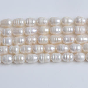 Perles de riz blanches naturelles d'eau douce de 8-9 mm en gros pour la fabrication de bracelets et de colliers avec des perles dispersées - Product Image 1