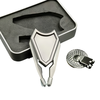 Vente en gros d'outils de réparation pour golf en forme de bouclier outil divot de golf ensembles de pinces à chapeau avec logo produits de golf essentiels personnalisés