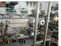 Machine à couches pour bébés entièrement automatique, capacité de production de 400 à 600 pièces/minute, machine à couches pour bébés de qualité supérieure