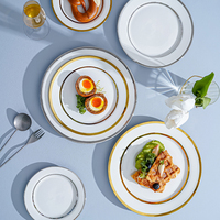 Assiettes de luxe en porcelaine pour hôtels, vaisselle en céramique, assiettes de restaurant en gros, service de vaisselle avec bord doré