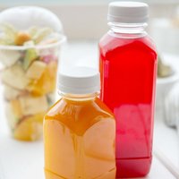 LOGO personnalisé Bouteilles de boisson carrées en plastique PET avec bouchons Bouteilles de jus vides de 8oz 10oz 12oz 16oz avec bouchon en PET