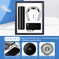 Coffret Cadeau d'Affaires 2025 3-en-1 : Bouteille Isotherme 10000 mAh, Masseur Cervical, Support Téléphone – Luxe, Logo Personnalisé, Multi-usage