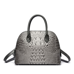 Sac à main de haute qualité en PU durable avec motif géométrique, décoration à rivets, bandoulière et fonction antivol pour usage quotidien - Product Image 1
