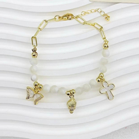 Bracelet tendance en cuivre plaqué or avec breloques papillon, croix et mini breloques émaillées, perles en verre transparent, vente en gros