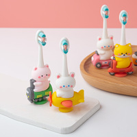 Brosse à dents pour enfants en gros d'usine avec poils ultra-doux personnalisés, manche en PP coloré, brosse à dents pour enfants pour les soins bucco-dentaires