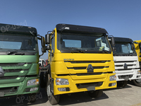 Sinotruk Howo 8x4 baru truk sampah berat Camion Benne Basculante Volquete Euro 5 standar emisi Diesel weiyai mesin kiri