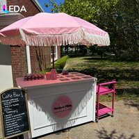 LEDA Nouveau design Chariot à dessert en acrylique blanc Chariot alimentaire mobile avec roues Parasol géant pour la décoration de mariage