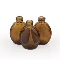 Bouteille en verre ambré de forme ovale de 10ml 20ml 30ml 50ml Contenant en verre ambré pour les soins de la peau Bouteille cosmétique pour huiles essentielles